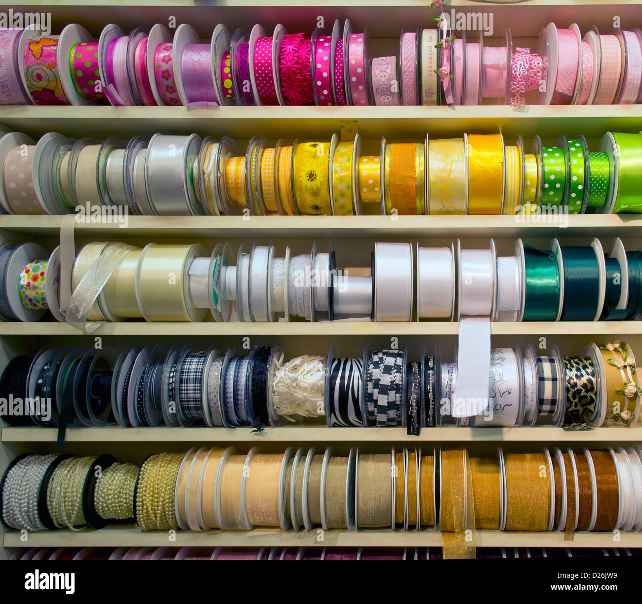 Haberdashery coloured ribbon ribbons display Stock Photo