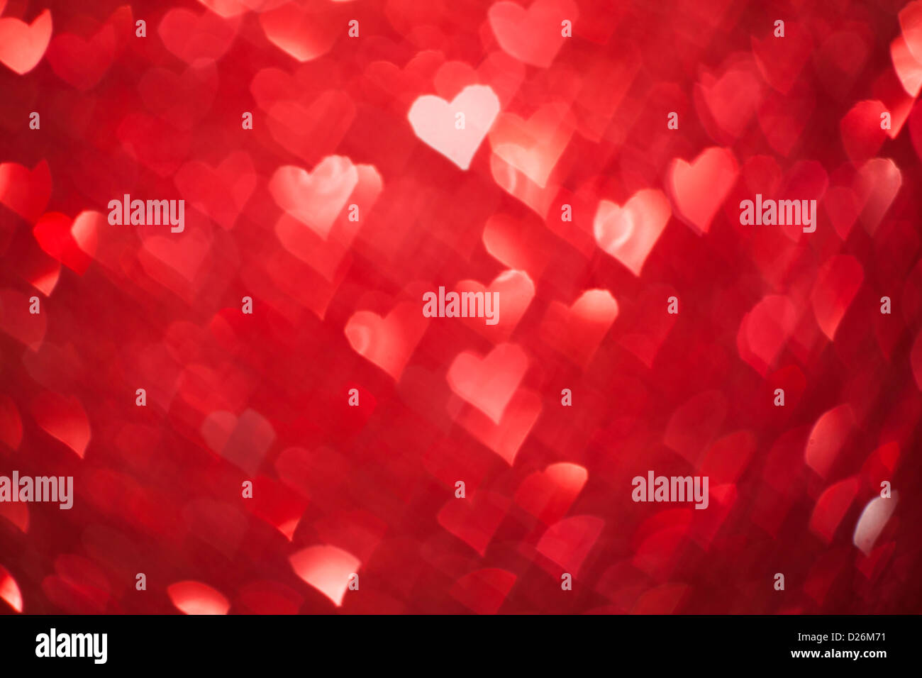 Shiny hearts bokeh light Valentine's day background Stock Photo - Alamy