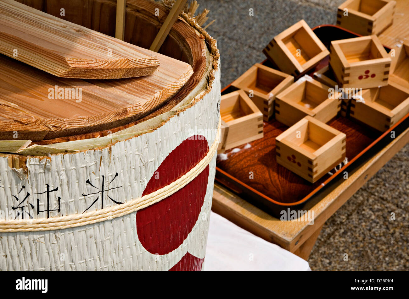A barrel of sake and traditional wooden box cups called “masu.” Stock Photo Alamy