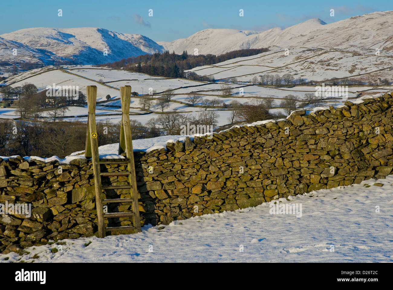 Landscape & ladder stile near Windermere, looking towards Woundale and the Troutbeck valley, Lake District, Cumbria, England UK Stock Photo