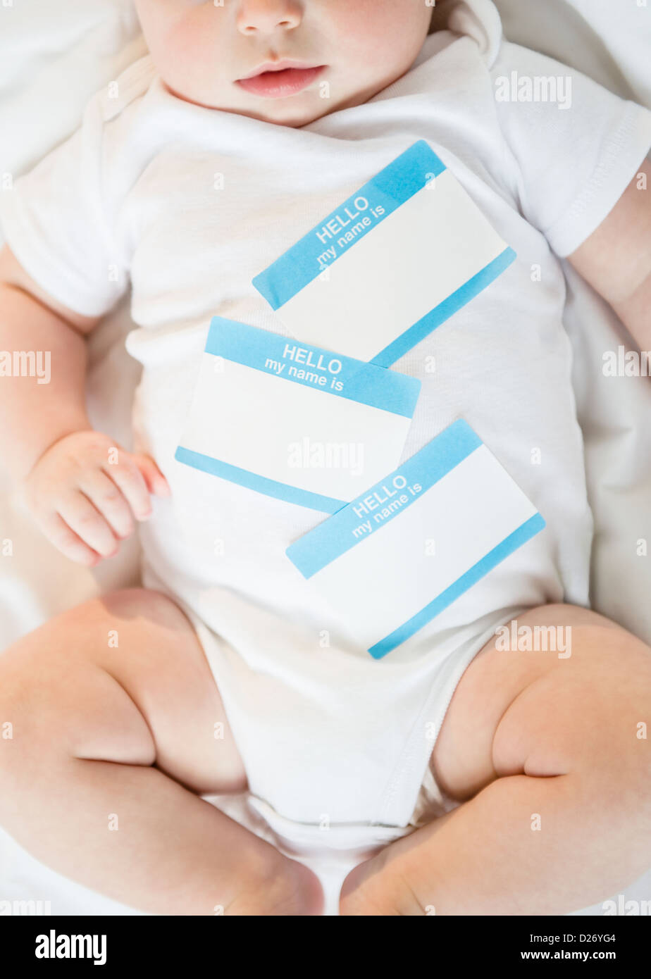 Identity labels belly of baby boy (2-5 months) Stock Photo