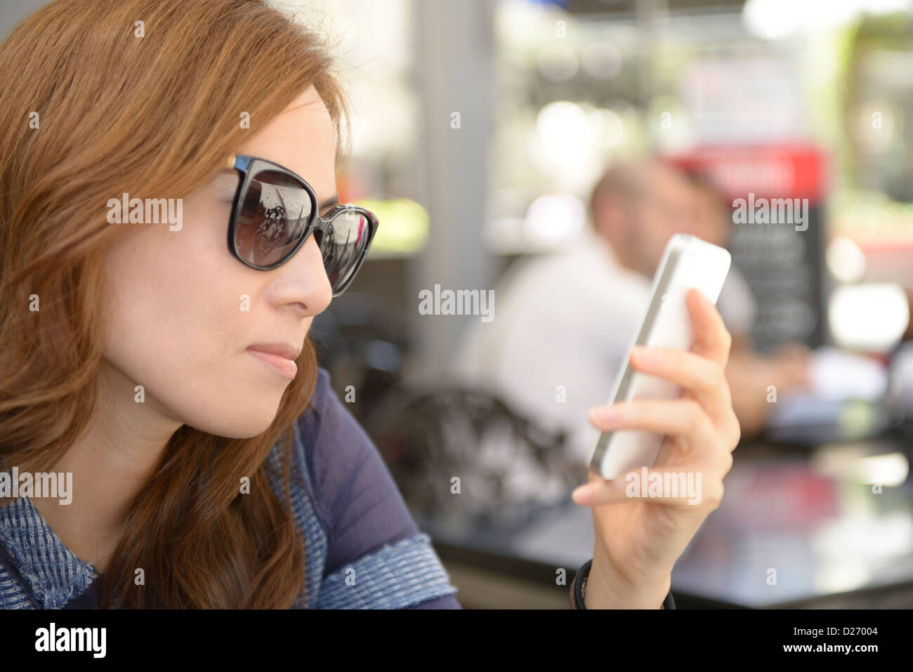 Beautiful woman taking self portrait photography with a mobile phone Stock Photo