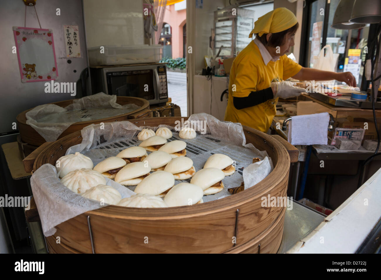 A Roadside Street Food Vendor Selling Steamed Pork Dumplings in