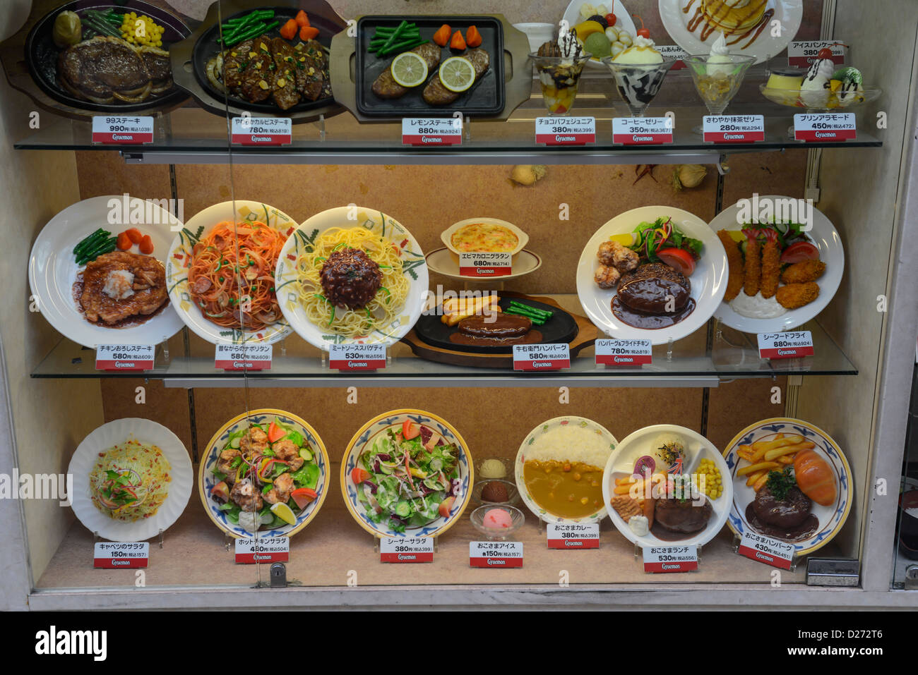 A Display of Replica Japanese Plated Food in a Window of a Restaurant