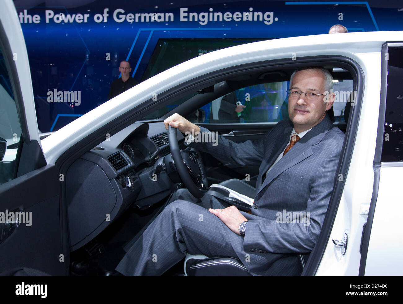 The HANDOUT picture shows the head Volkswagen Group of America, Jonathan Browning, sitting behind the steering wheel of a Volkswagen Passat Performance Concept car at the North American International Auto Show (NAIAS) in Detroit, USA, 14 January 2013. NAIAS opened officially on 14 January 2013 and is open for the general public from 19 January to 27 January 2013. Photo: Friso Gentsch / Volkswagen Stock Photo