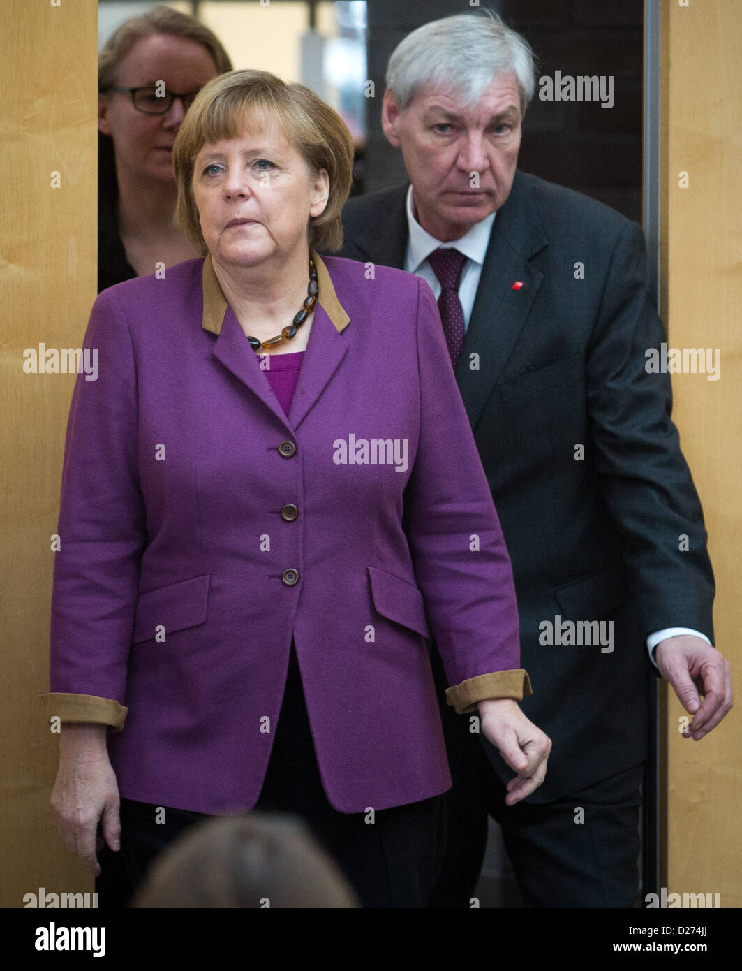 German Chancellor Angela Merkel arrives to a press conference next to ...