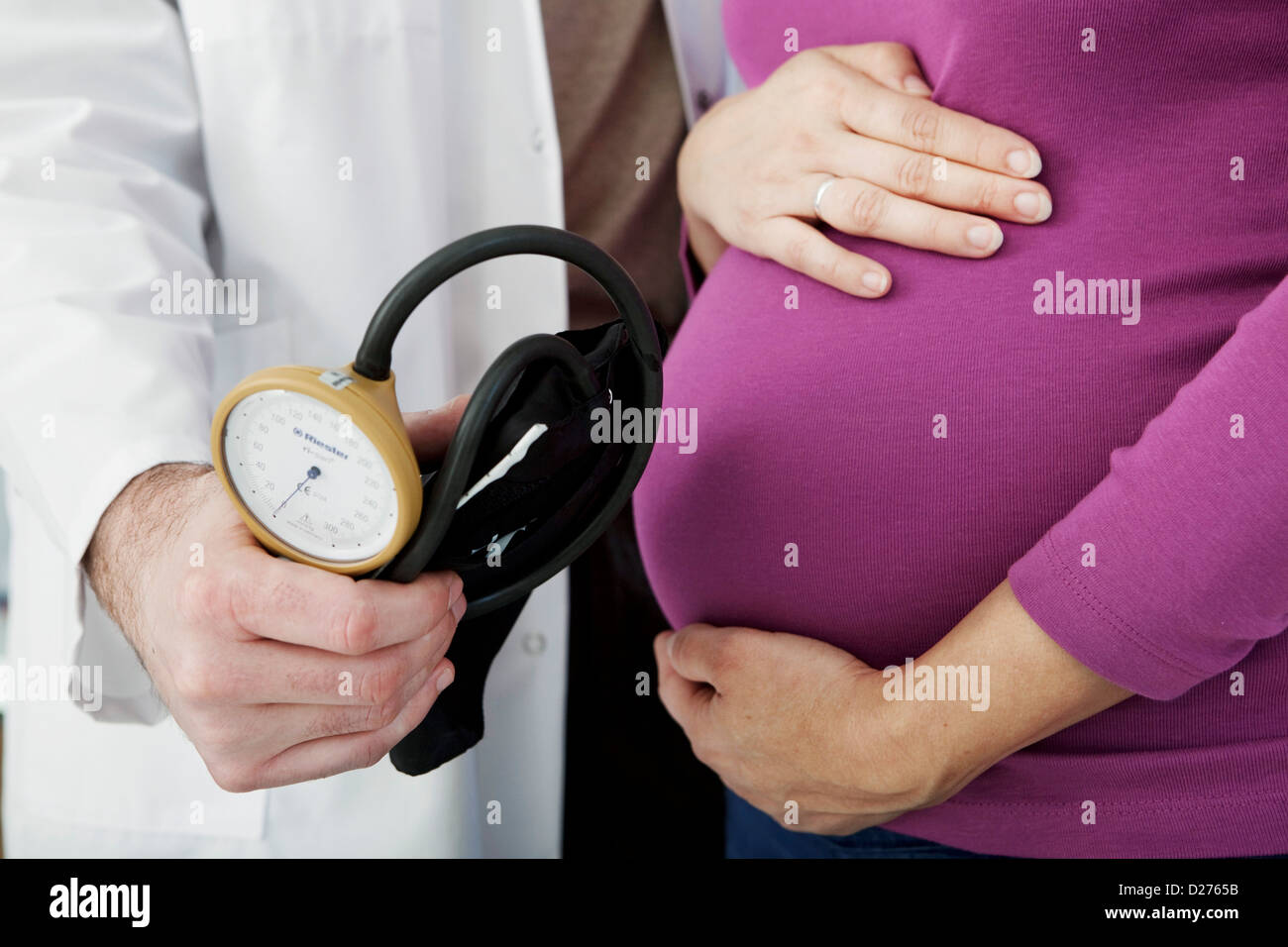 PREGNANT WOMAN IN CONSULTATION Stock Photo