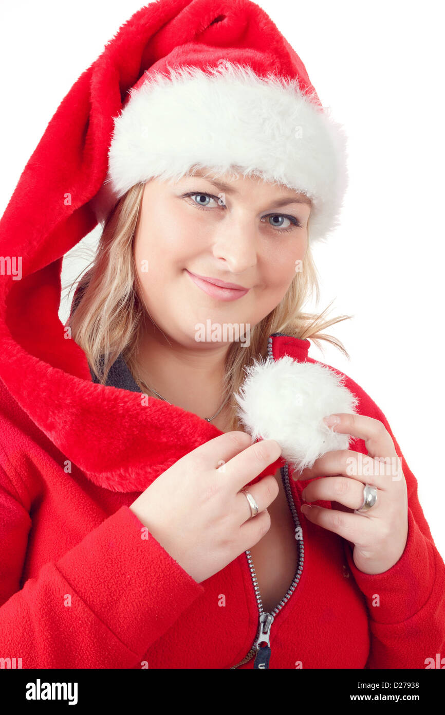 Portrait of joyful pretty woman in red santa claus hat smiling on white ...