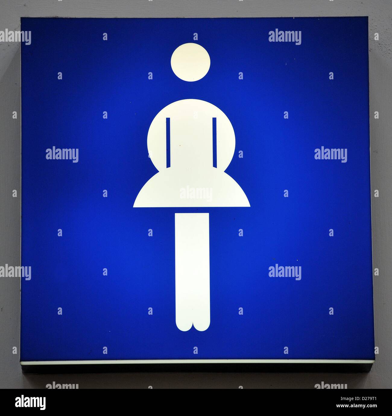 Sign for woman toilet. Photo: Frank May Stock Photo
