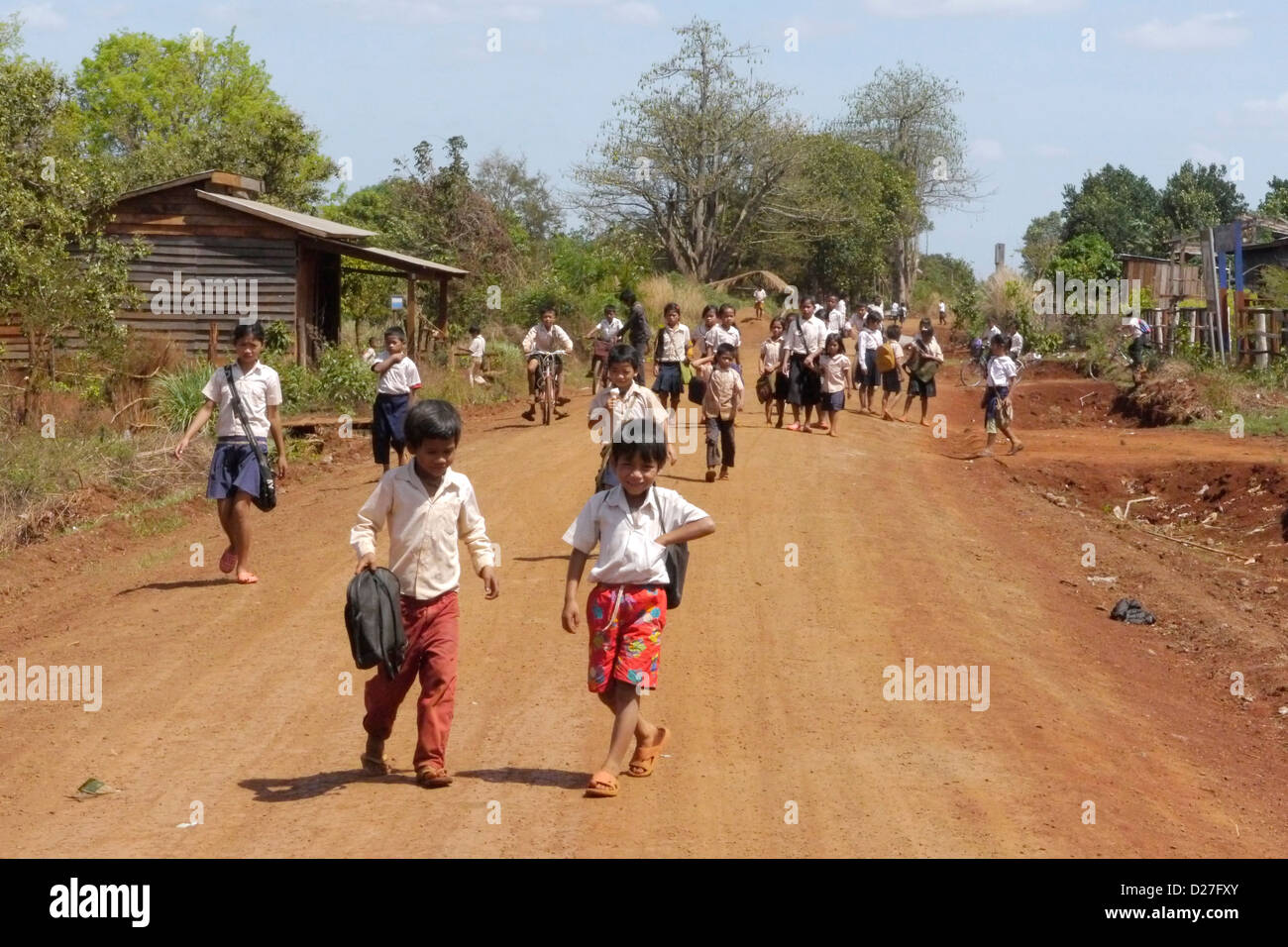 Cambodia - children walking home from school Stock Photo - Alamy
