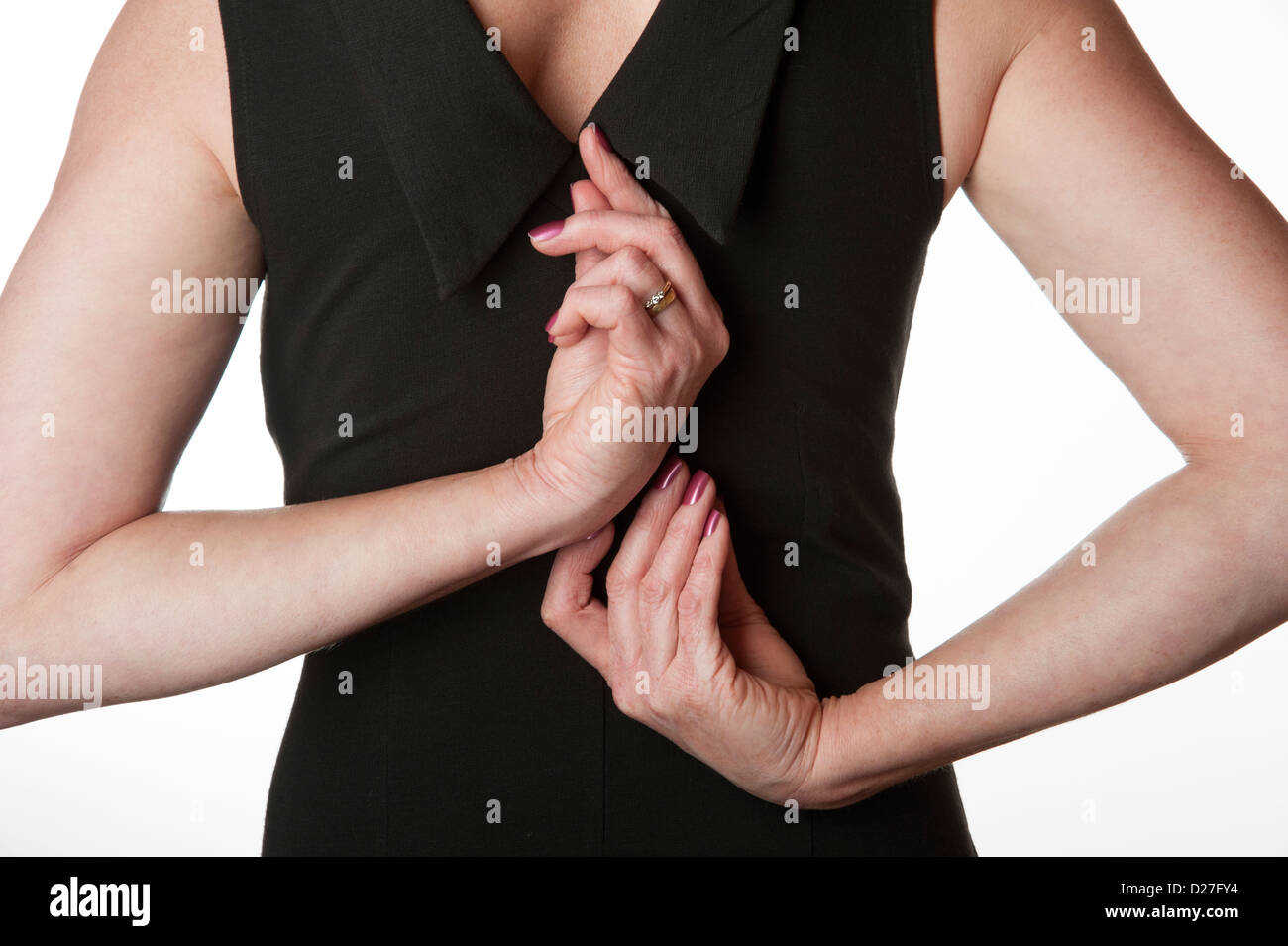 Woman pulling the zip fastener up or down on her little black dress