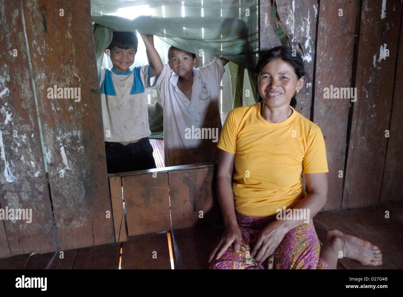 Cambodia using a mosquito net Stock Photo Alamy