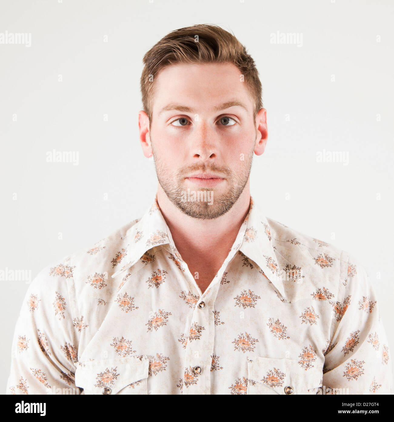 Studio portrait of crosseyed man Stock Photo Alamy