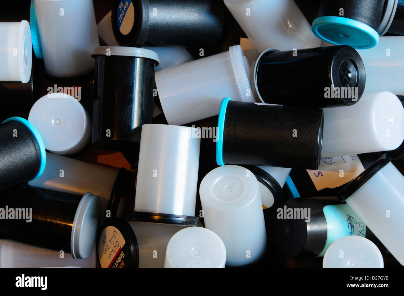 A pile of old 35mm film canisters. Stock Photo