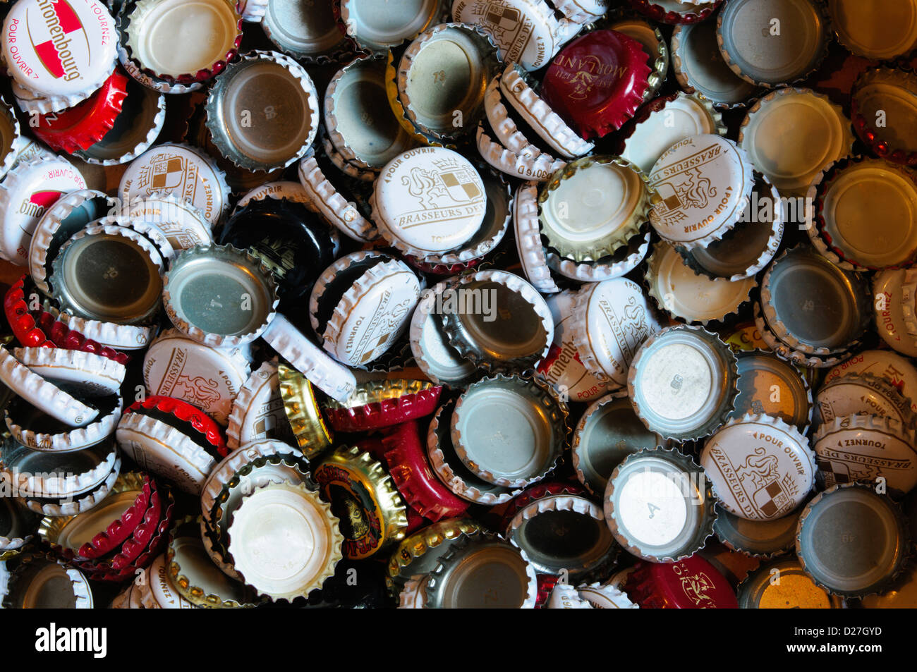 A pile of beer bottle tops. Stock Photo