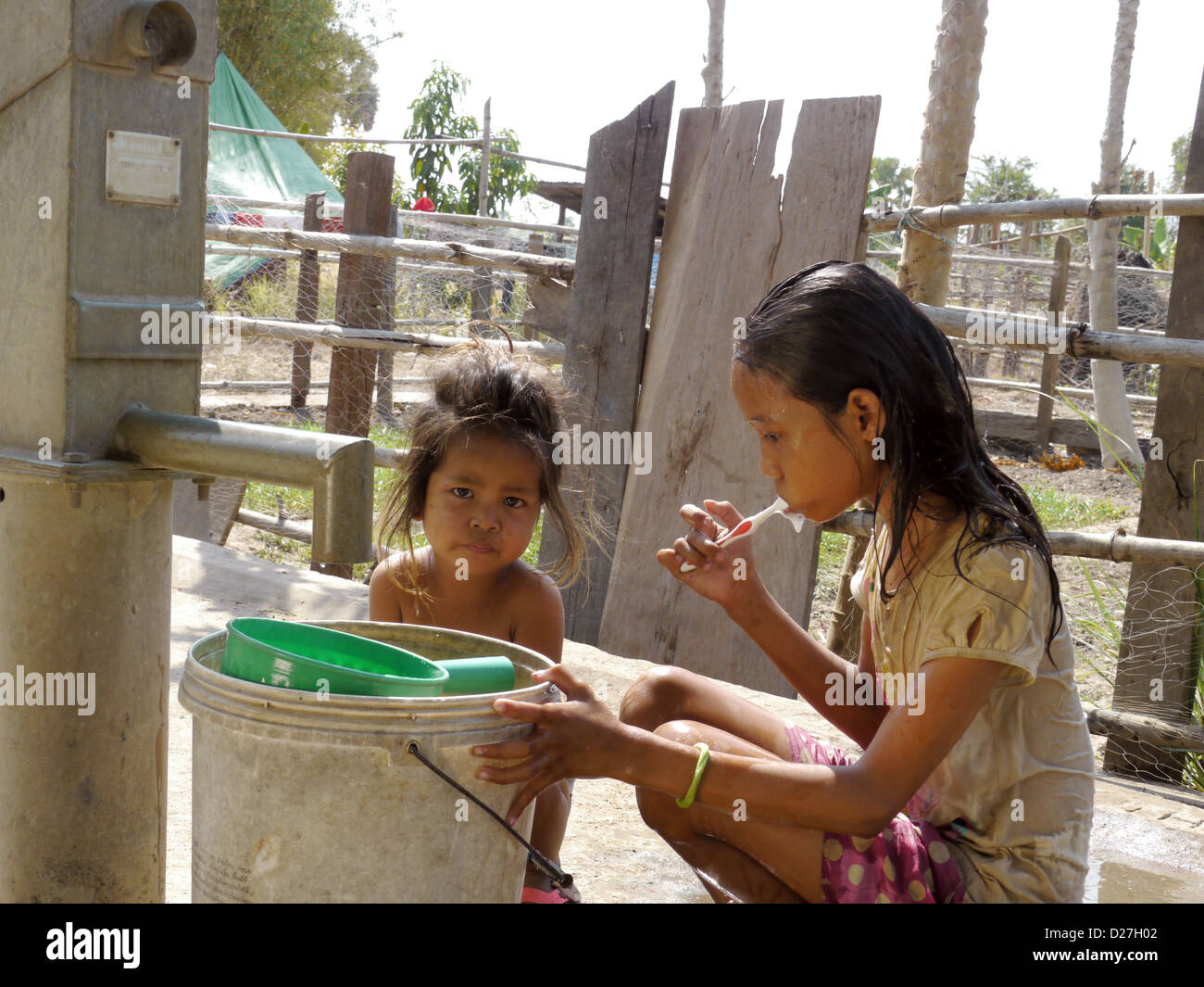 girls cambodia washing 
