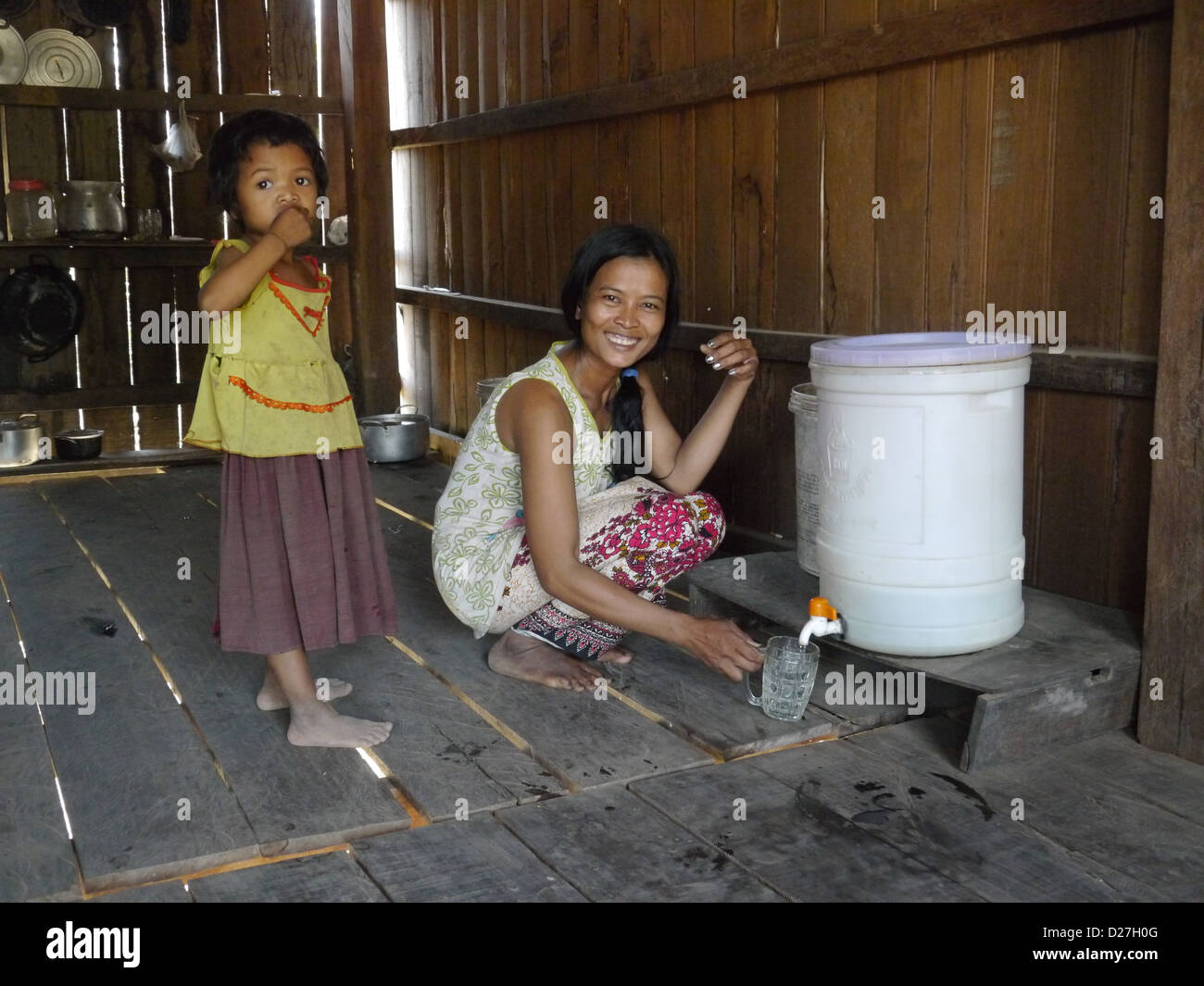 Cambodia Using a water filter, Stung Treng. Stock Photo