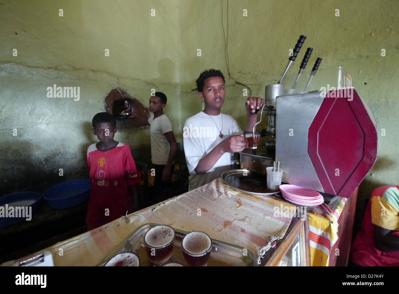 ETHIOPIA The 'Salam Cafe' in Chagni, Beni Shangul Gumuz region. Employees using espresso machine. Stock Photo