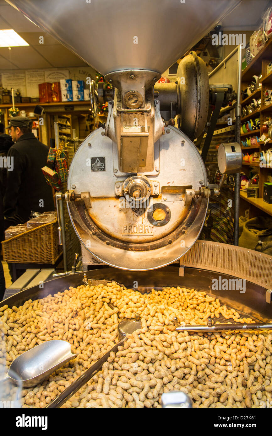 Roasting peanuts at Blanche Dael coffee roaster, in the historic center of Maastricht, Limburg, Netherlands, Europe. Stock Photo