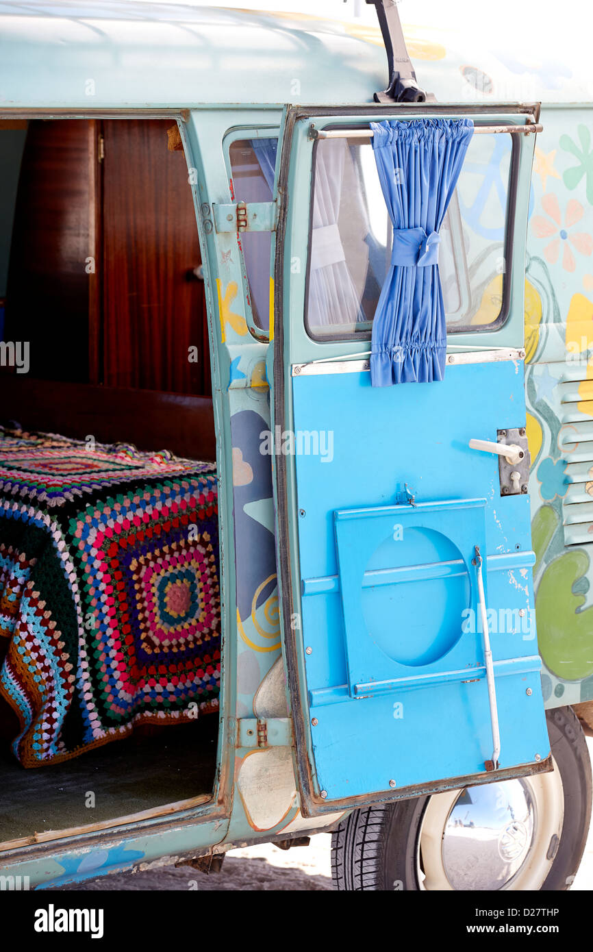 Open door of customized VW camper van with rug Stock Photo Alamy