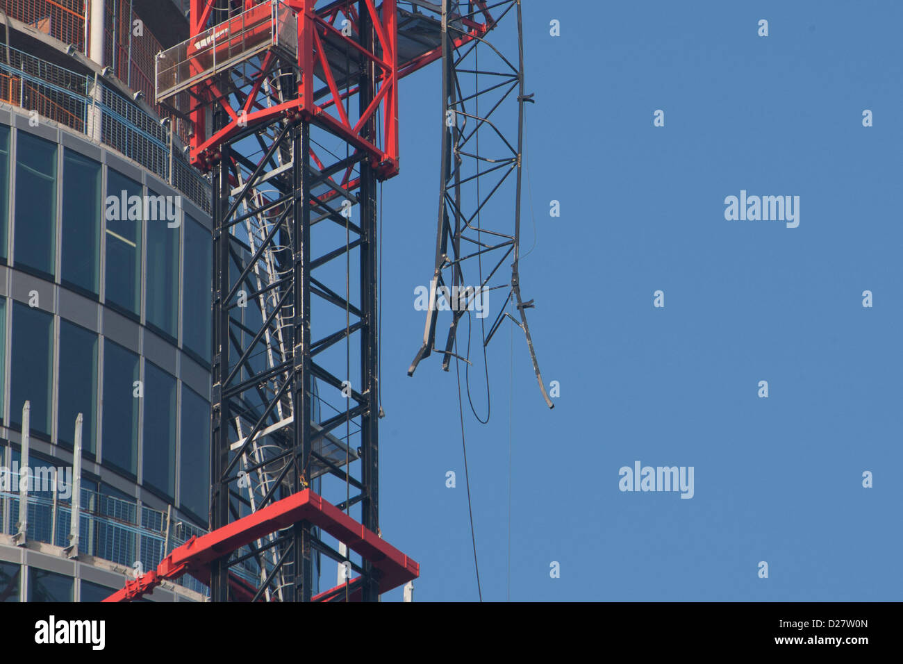 London, UK. 16th January 2013. Damaged crane on St George's Wharf tower that an Agusta 109 helicopter had collided with in Wandsworth Road in Vauxhall, London, 16th January 2013. Credit:  martyn wheatley / Alamy Live News Stock Photo