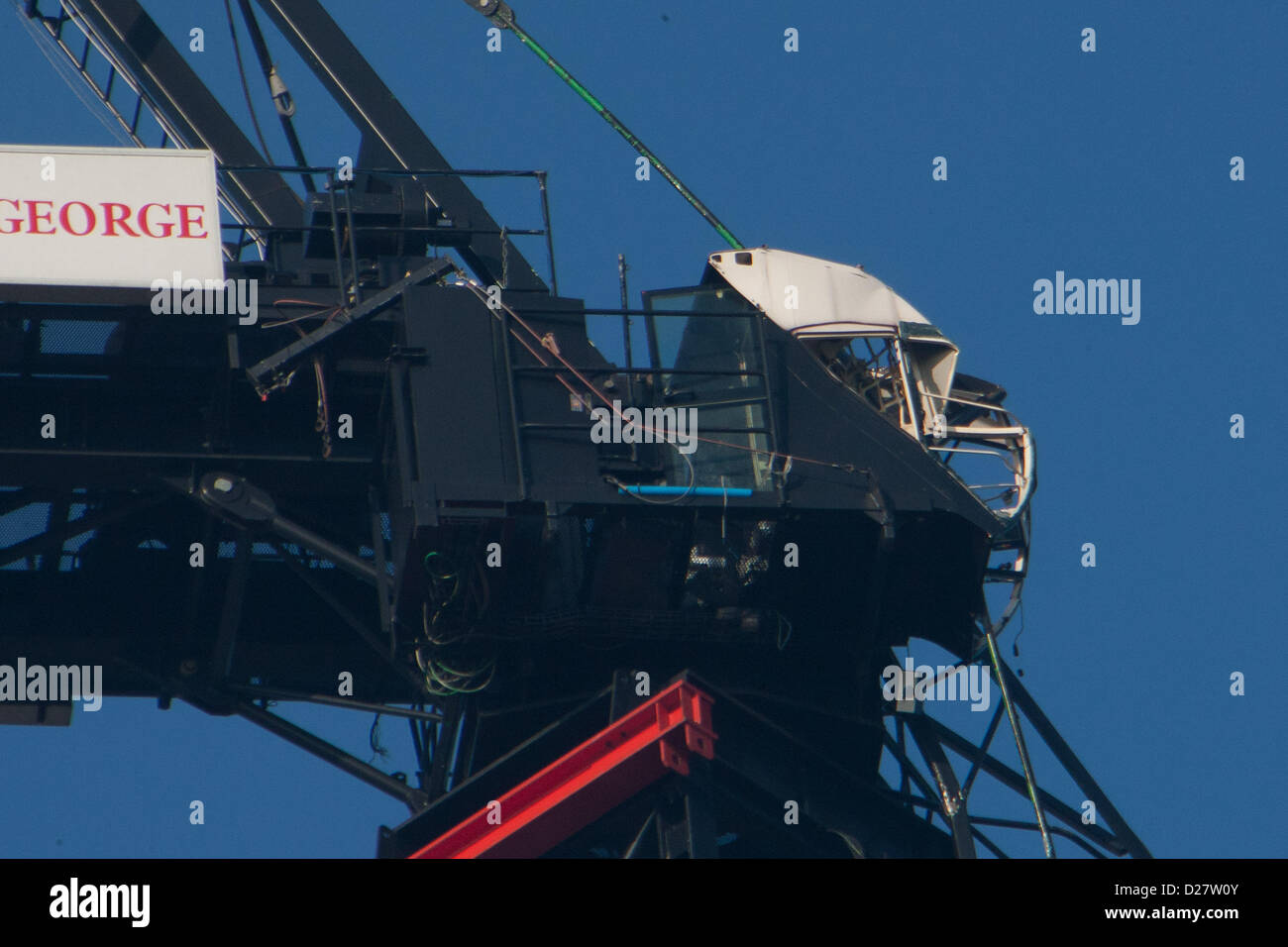 London, UK. 16th January 2013. Damaged cab on crane on St George's Wharf tower that an Agusta 109 helicopter had collided with in Wandsworth Road in Vauxhall, London, 16th January 2013. Credit:  martyn wheatley / Alamy Live News Stock Photo