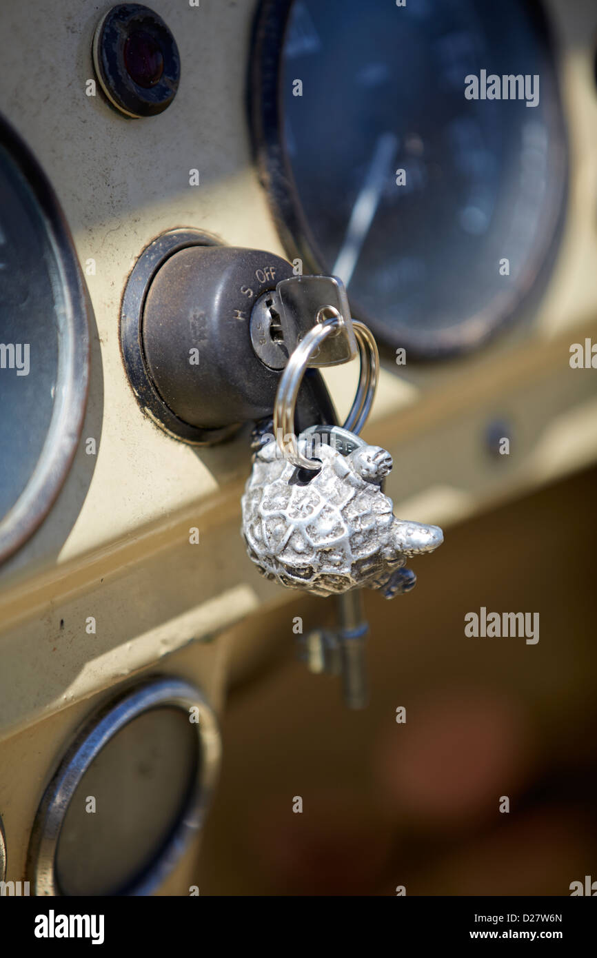 close up detail of keys in the ignition of a vintage Land Rover Jeep