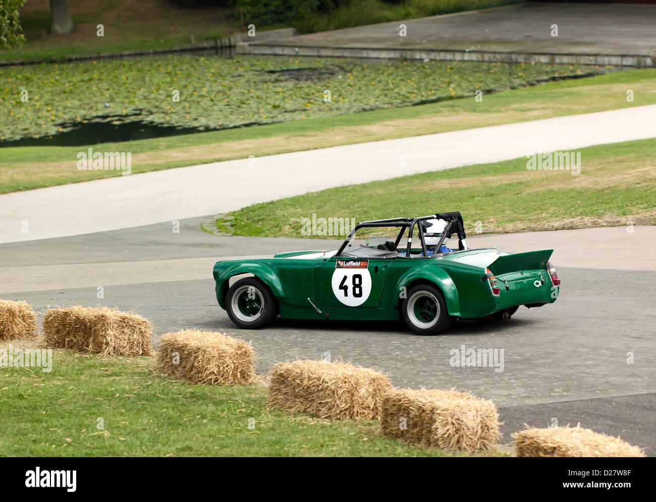 Steve Luscome driving a 1966/1970 MG Midget in the Sprint event at motorsport at the palace 2011 Stock Photo