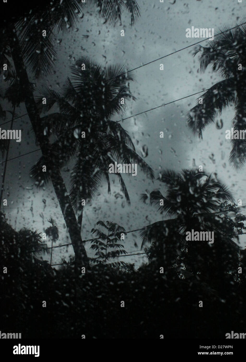 A view of a rainy village through the glass. Stock Photo
