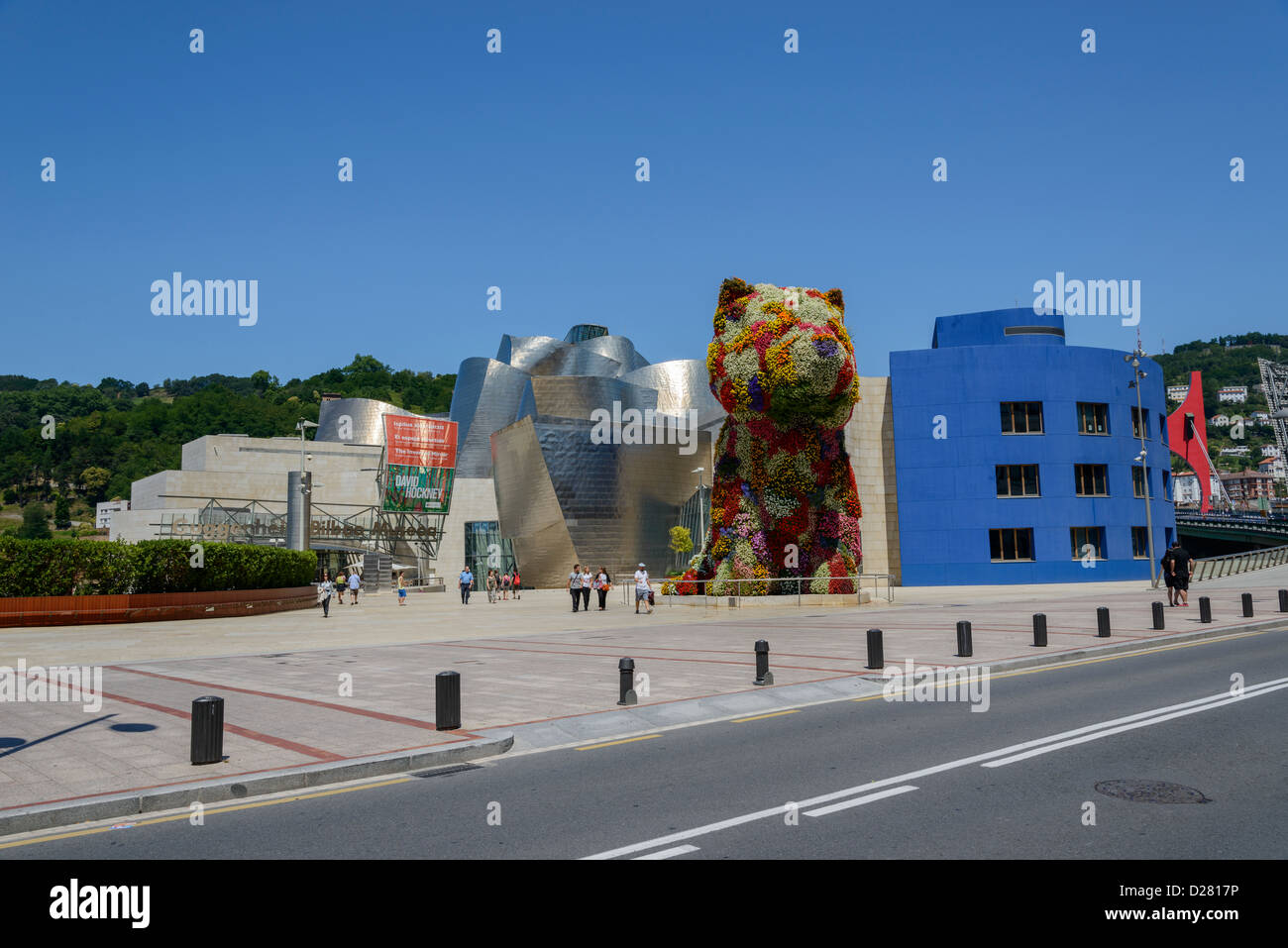 Giant dog sculpture with flowers in front of Guggenheim Bilbao museum