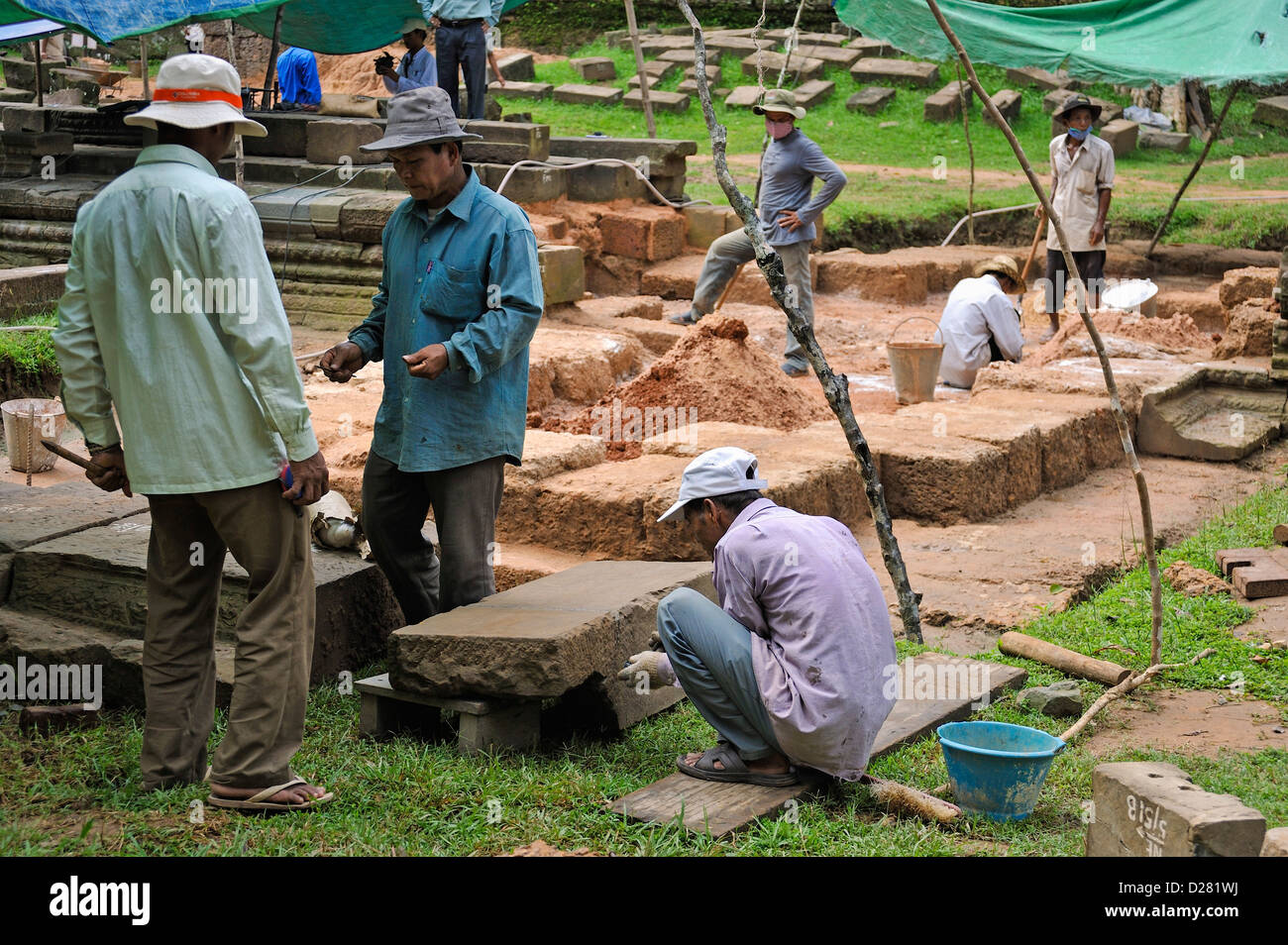 Archaeologists at a dig at Preah KhanTemple, Angkor Wat, Cambodia Stock Photo