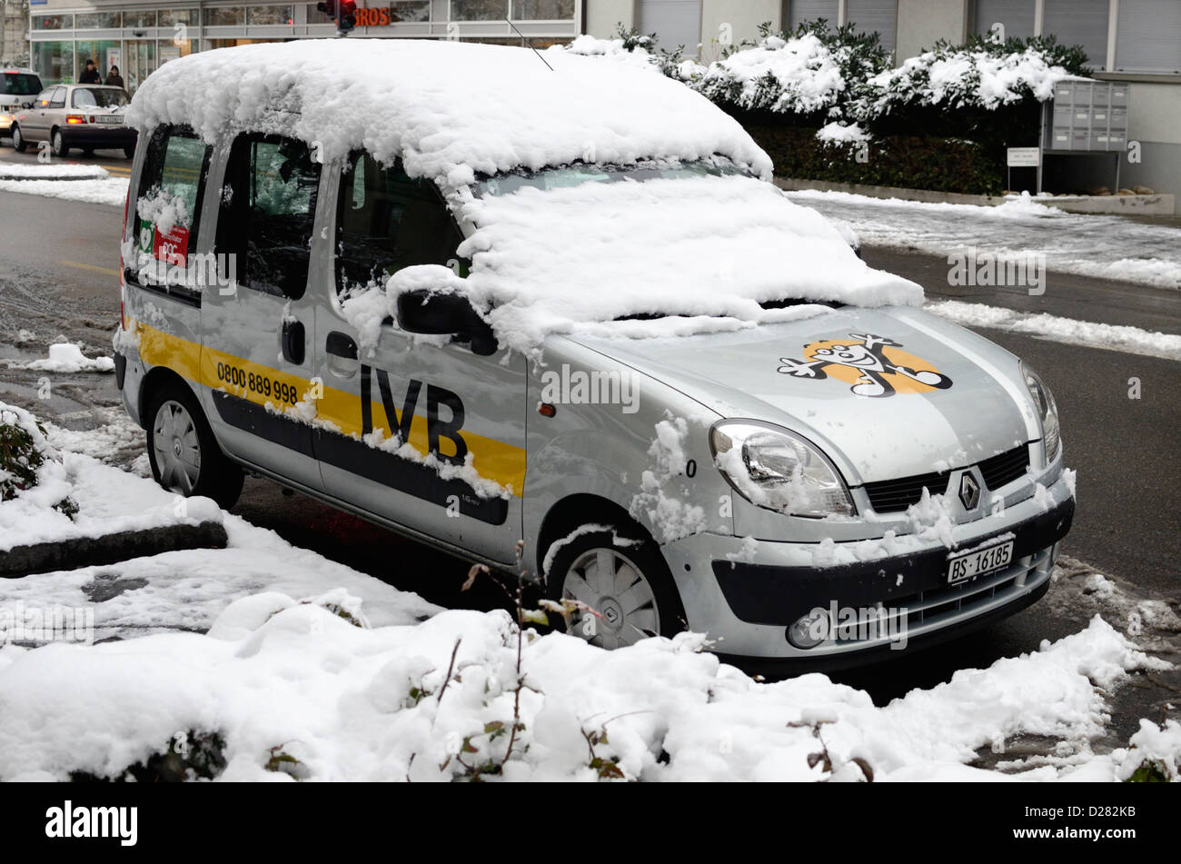 Commercial vehicle covered in snow, Basel, Switzerland Stock Photo