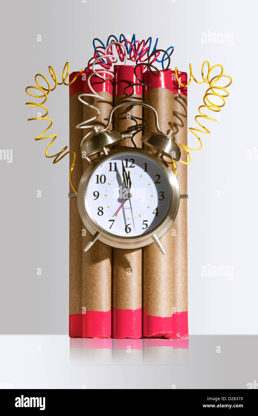 Fake bomb with dynamite and clock detonator. Stock Photo