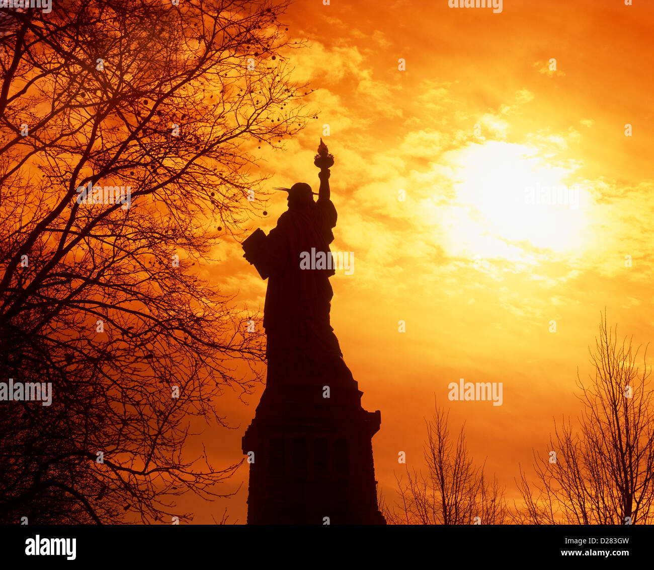 Rear view of Statue of Liberty at sunset, New York, USA Stock Photo