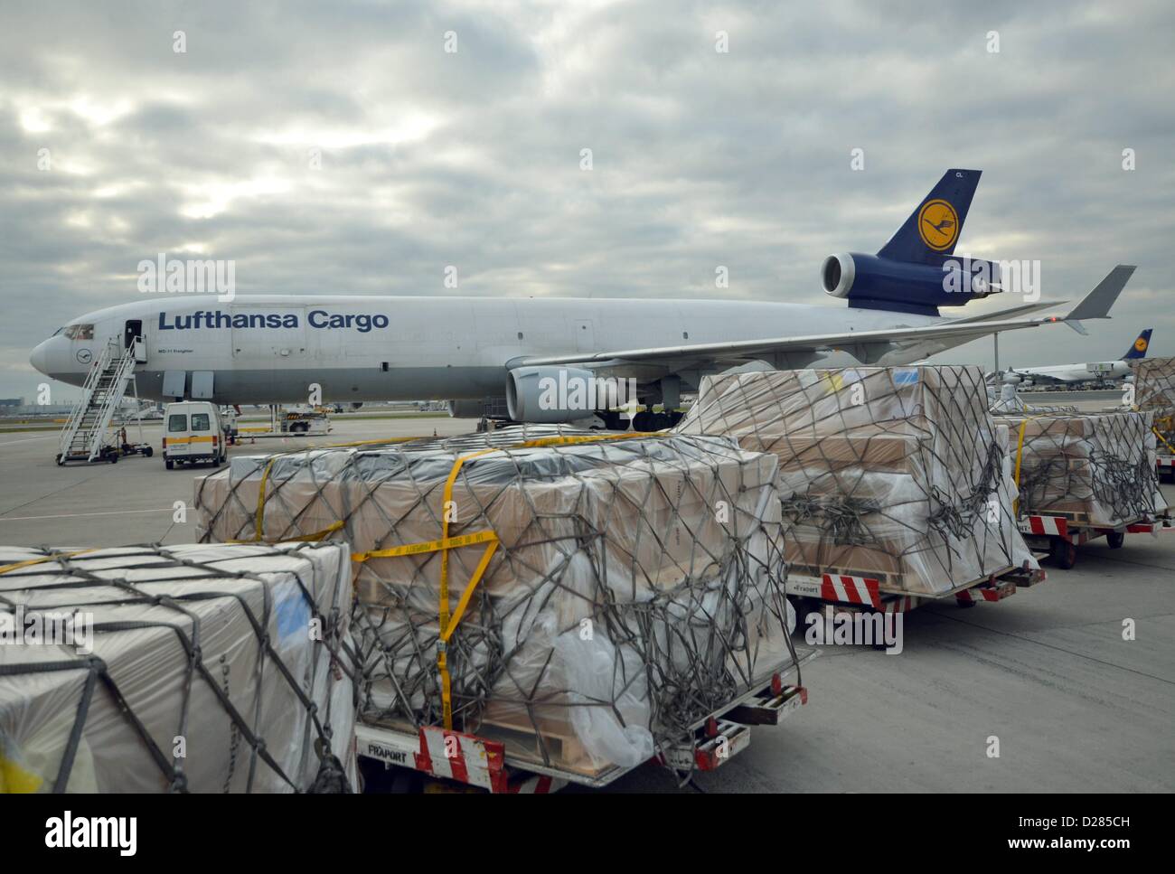 Cargo at the Rhein-Main Airport in Frankfurt nxt to a MD-11 Lufthansa Cargo  aircraft Stock Photo - Alamy