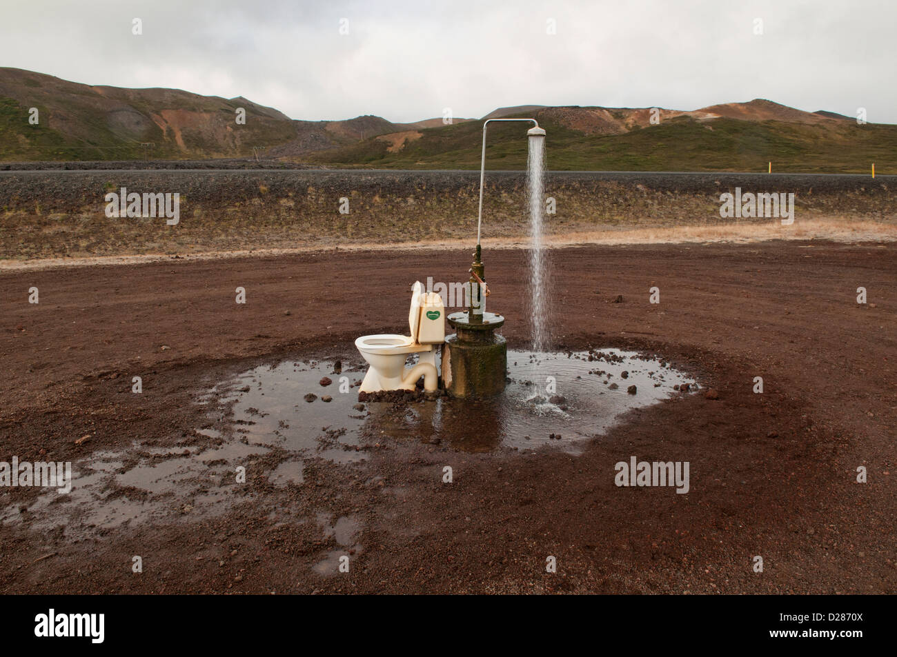 outdoor toilet and hot spring shower from geothermal power at the Krafla volcano near Lake Myvatn, Iceland Stock Photo