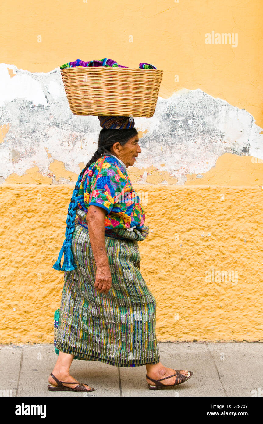Guatemala, Antigua. Mayan woman wearing traditional Mayan huipiles (blouse) and corte (skirt), Antigua, Guatemala. Stock Photo