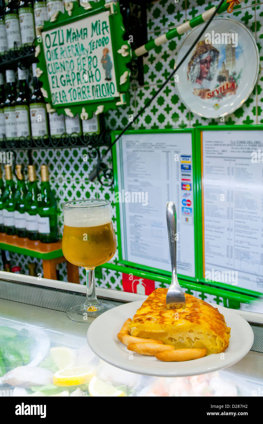Spanish omelet and glass of beer in typical tavern. Madrid, Spain. Stock Photo