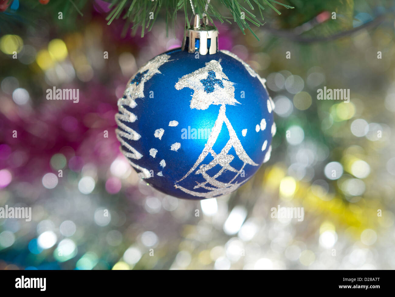 blue Christmas ball on background green pine Stock Photo