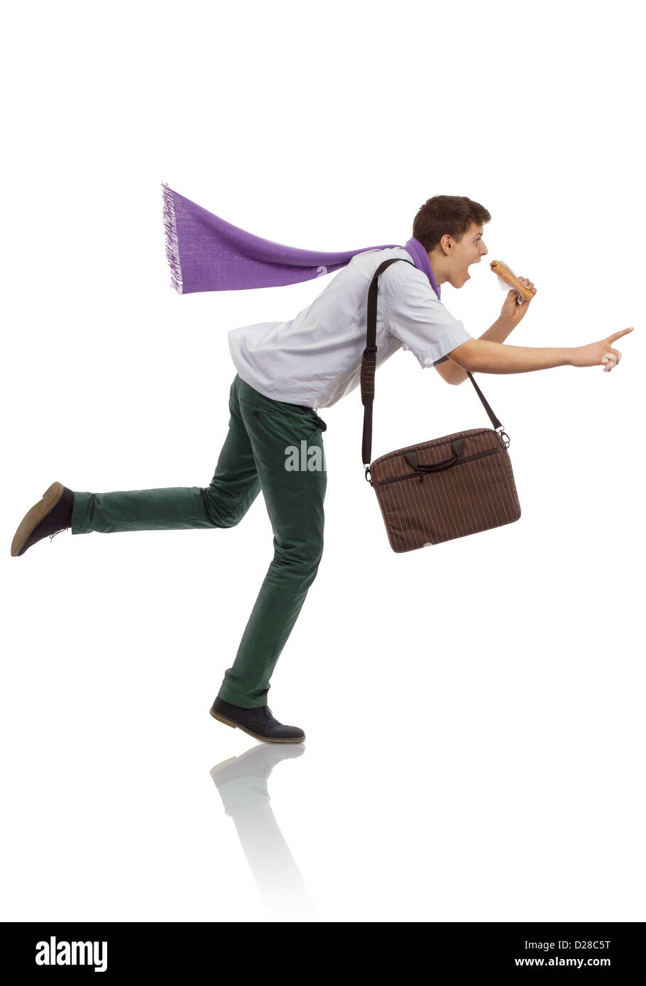 Young businessman running in a hurry Stock Photo