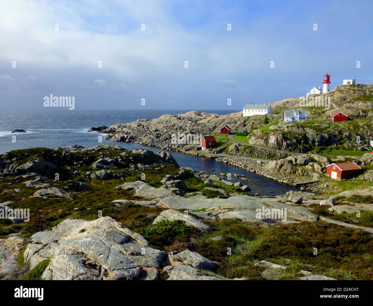 Lindesnes lighthouse. Lindesnes fyr is a coastal lighthouse on southernmost tip of mainland Norway. Stock Photo