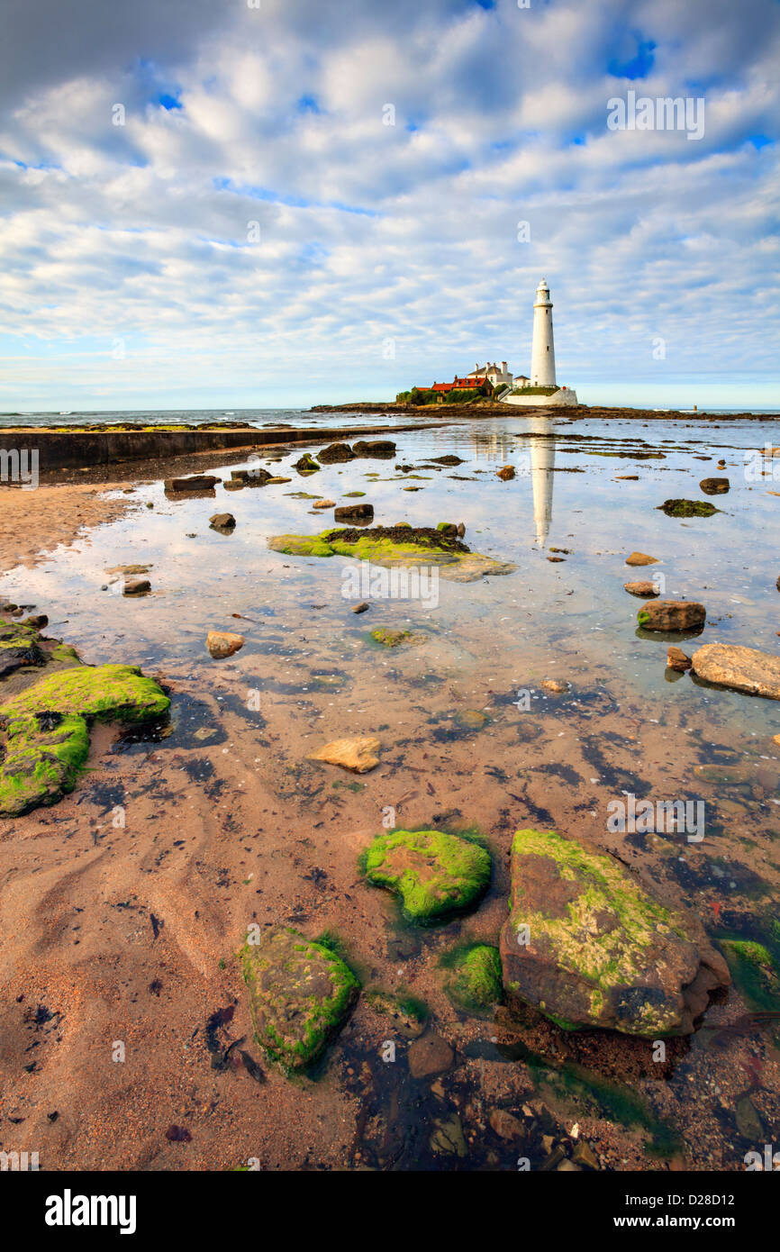 St Mary's Lighthouse near Whitley Bay on the North Tyneside coast.  Captured shortly before high tide using a wide angle lens on Stock Photo