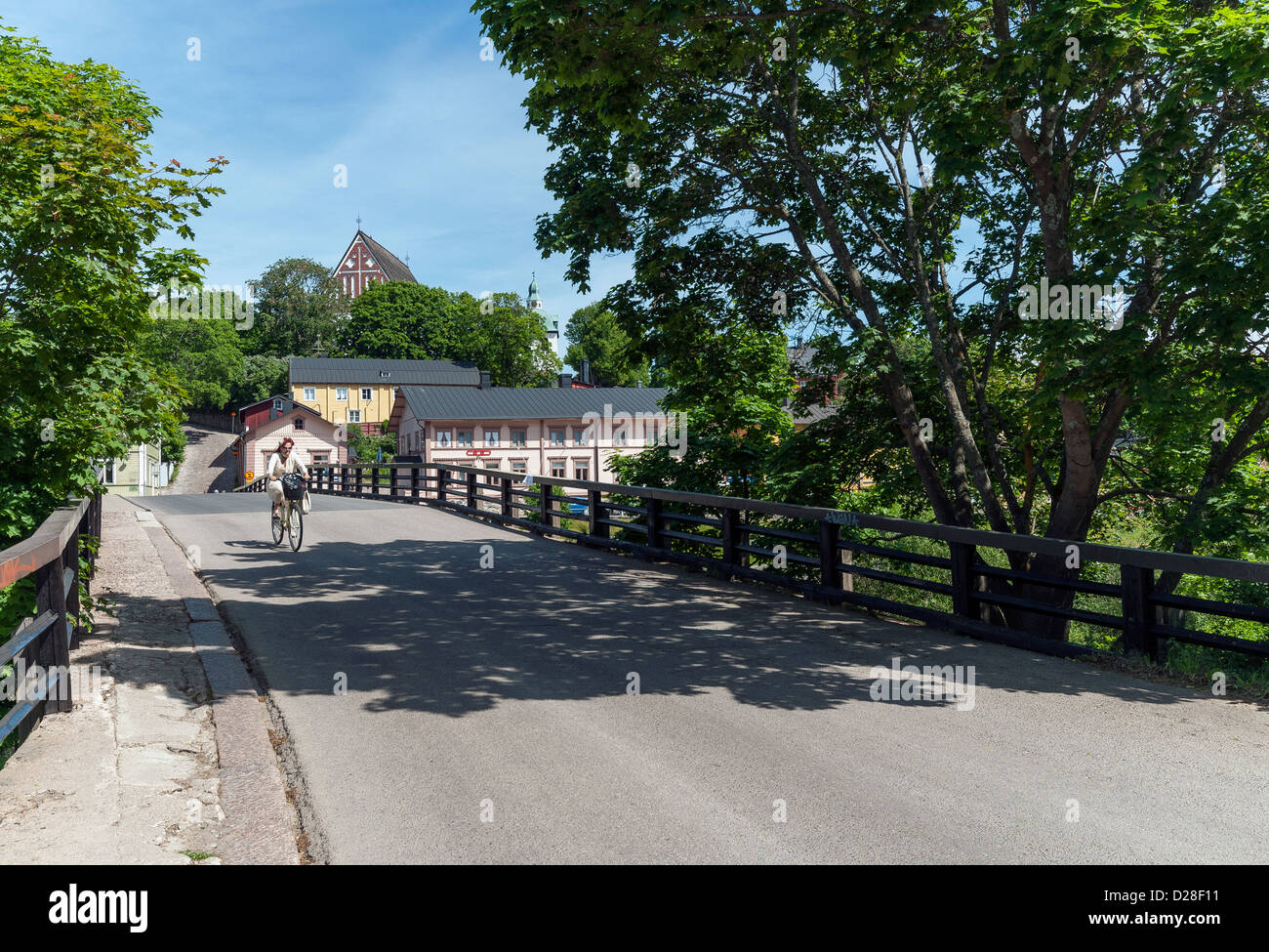 The Old Bridge leading into Old Town with Porvoo Cathedral sitting on the hill in Porvoo, Finland Stock Photo