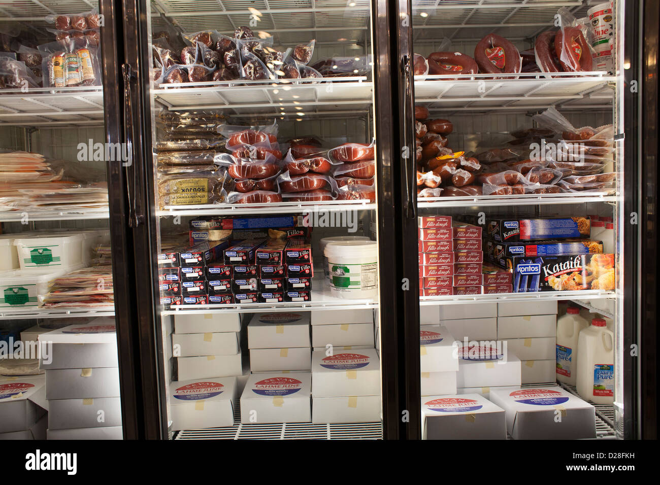 The refrigerated case in a Middle Eastern deli in Watertown, Massachusetts has a wide variety of products. Stock Photo