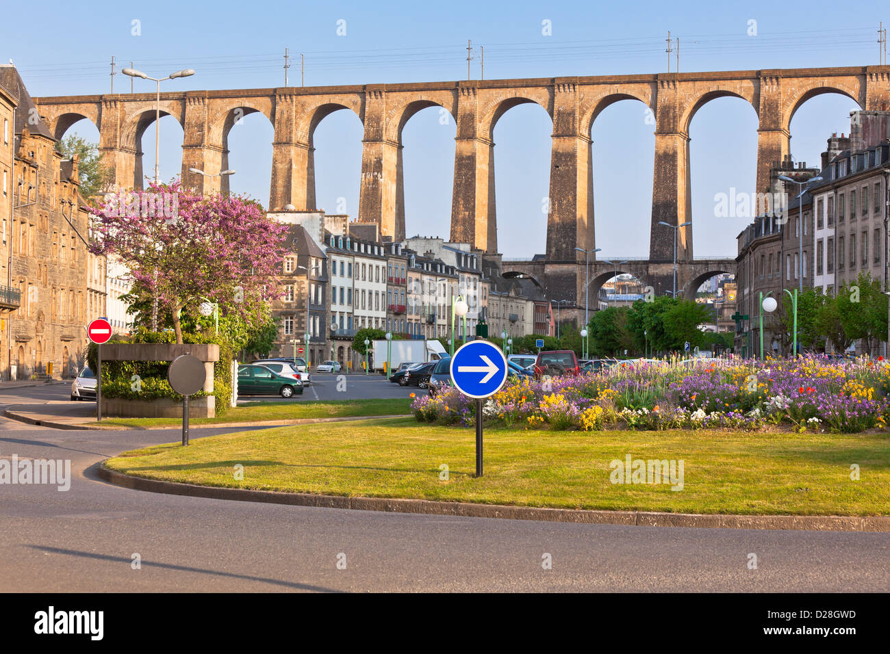 Large stone bridge in Morlaix town, Brittany, France at sunny evening Stock Photo