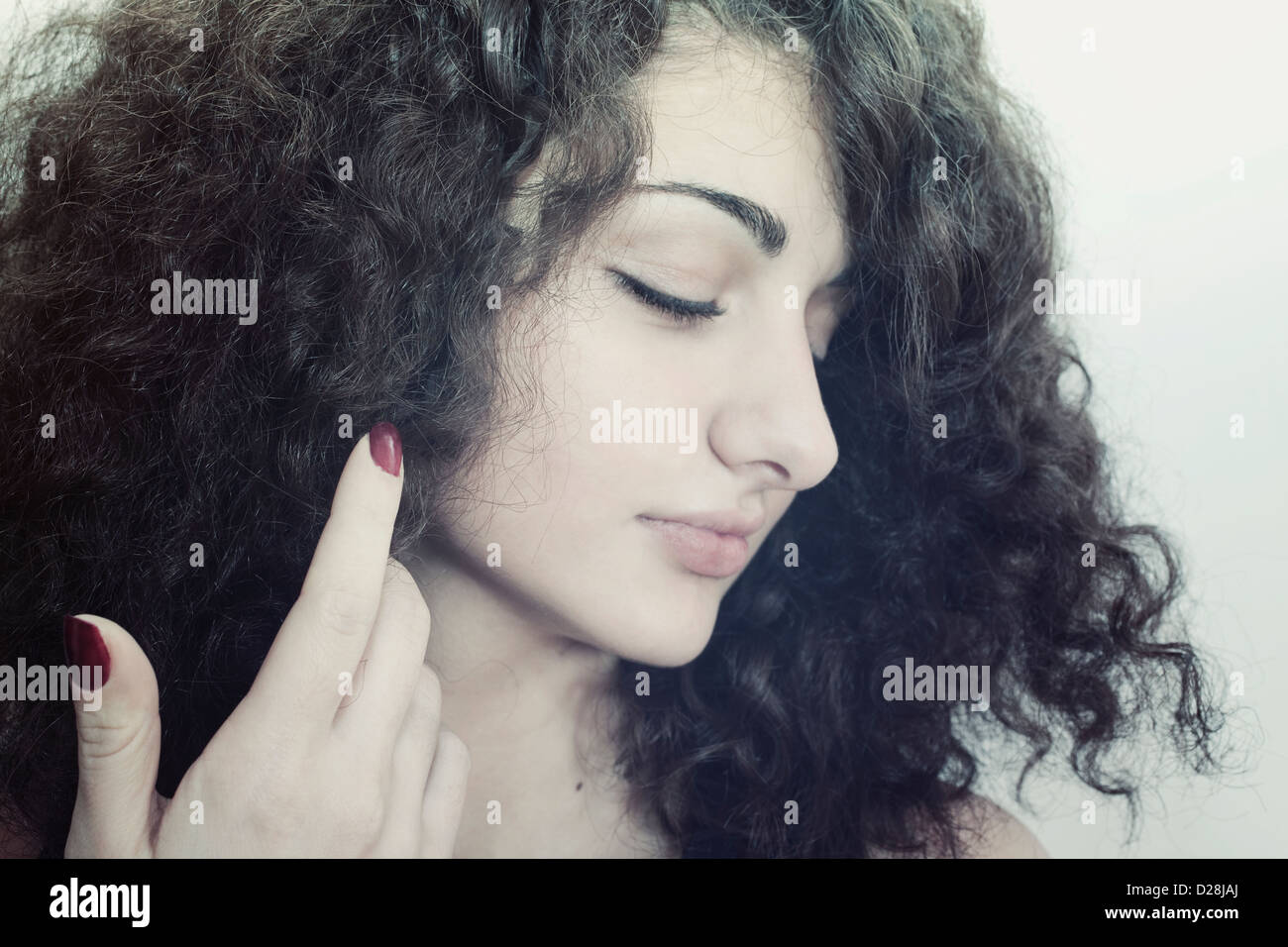 Beautiful brunette female curly hi-res stock photography and images - Alamy