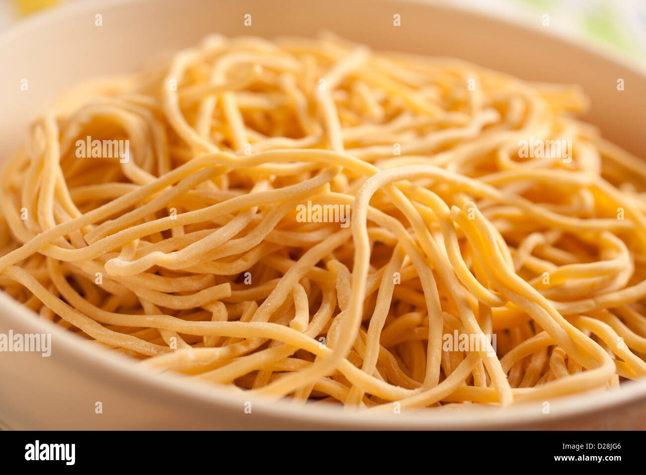 Uncooked fresh lo mein noodles Stock Photo Alamy