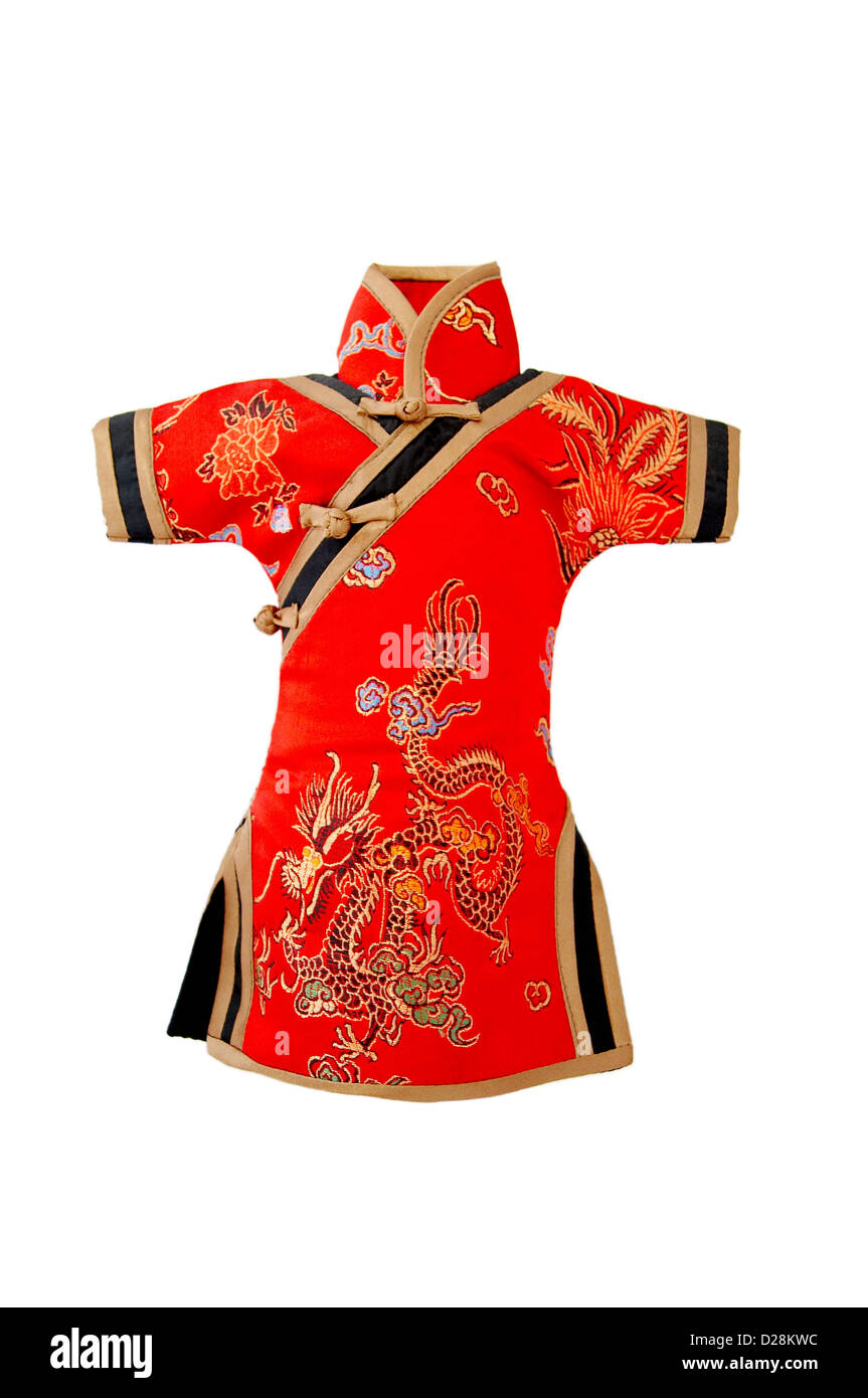 Red traditional Chinese silk dress,also called cheong-sam,isolated on white. Stock Photo