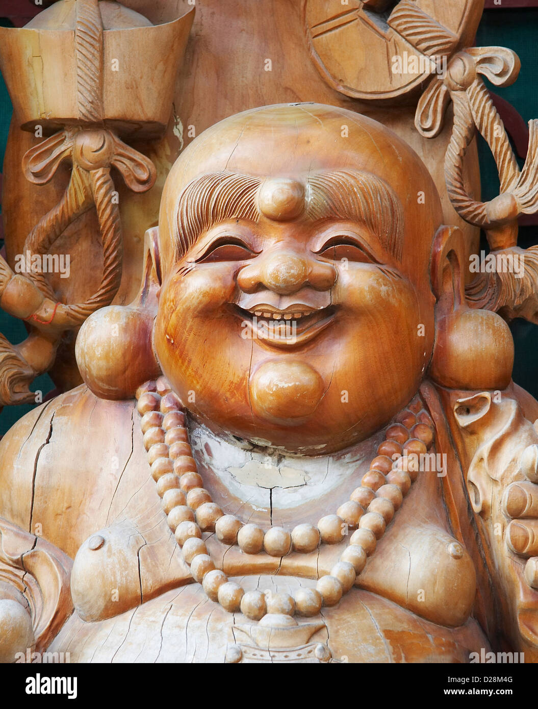 Wooden buddha statue Stock Photo