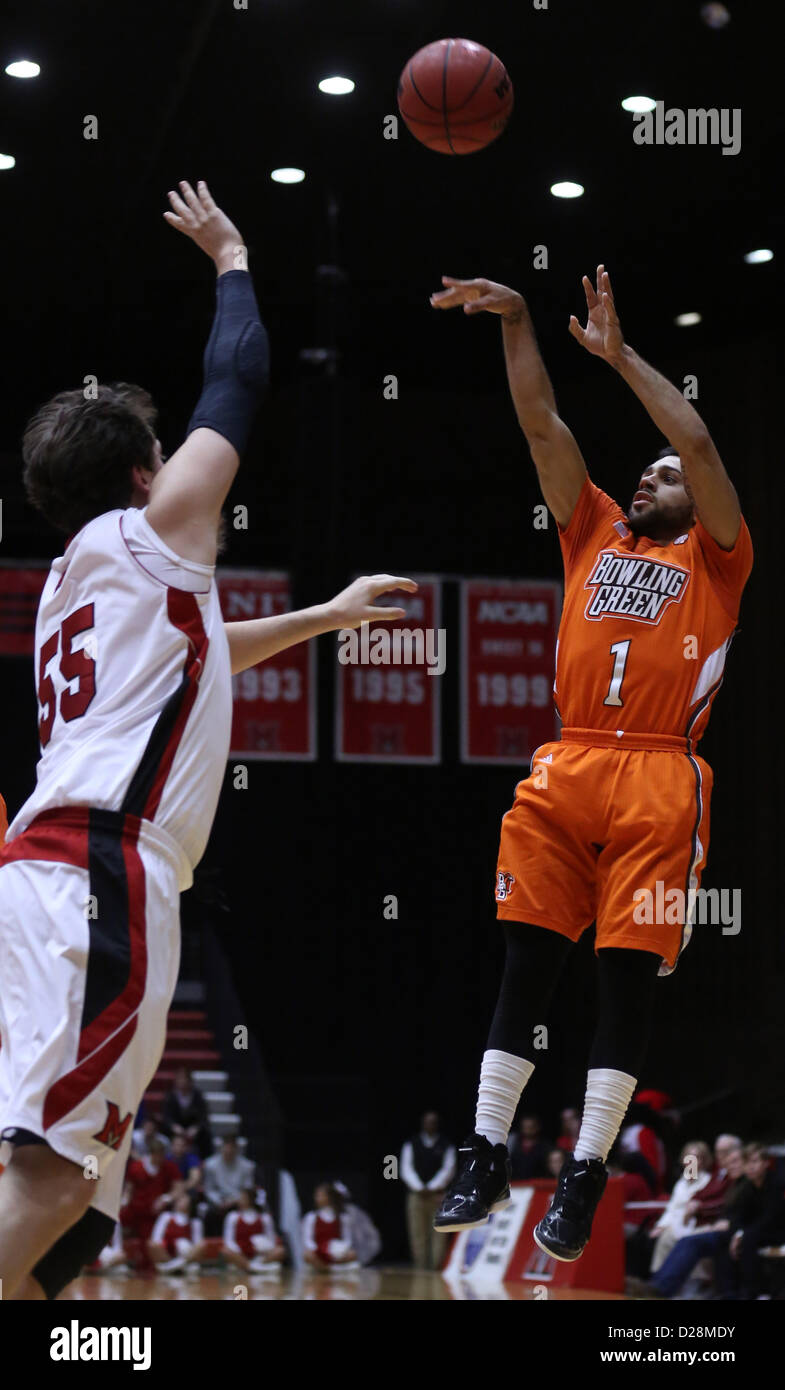 Jan. 16, 2013 - Oxford, Ohio, U.S - Bowling Green State University JORDON CRAWFORD-1 puts up a three point shot over Miami of Ohio University VINCE LEGARZA-55 in the second half of play with Bowling Green State University. On Wednesday, January ,16, 2013 . As the Redhawks beat Bowling Green State 63 to 61 in Oxford,Ohio. (Credit Image: © Ernest Coleman/ZUMAPRESS.com) Stock Photo